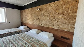 Frigobar, escrivaninha, Wi-Fi de cortesia, roupa de cama