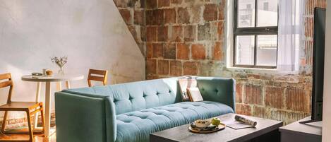 40-inch flat-screen TV with digital channels, TV, streaming services