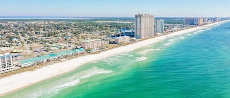 On the beach, sun-loungers