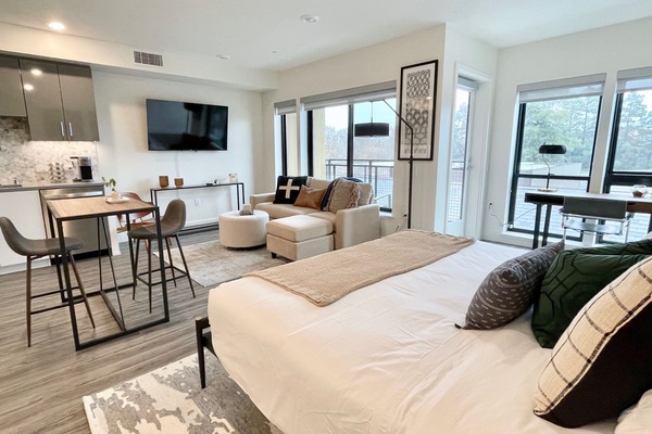 King Bed outfitted with luxury bedding atop a supportive hybrid mattress