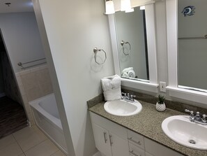Combined shower/bathtub, hair dryer, towels, soap