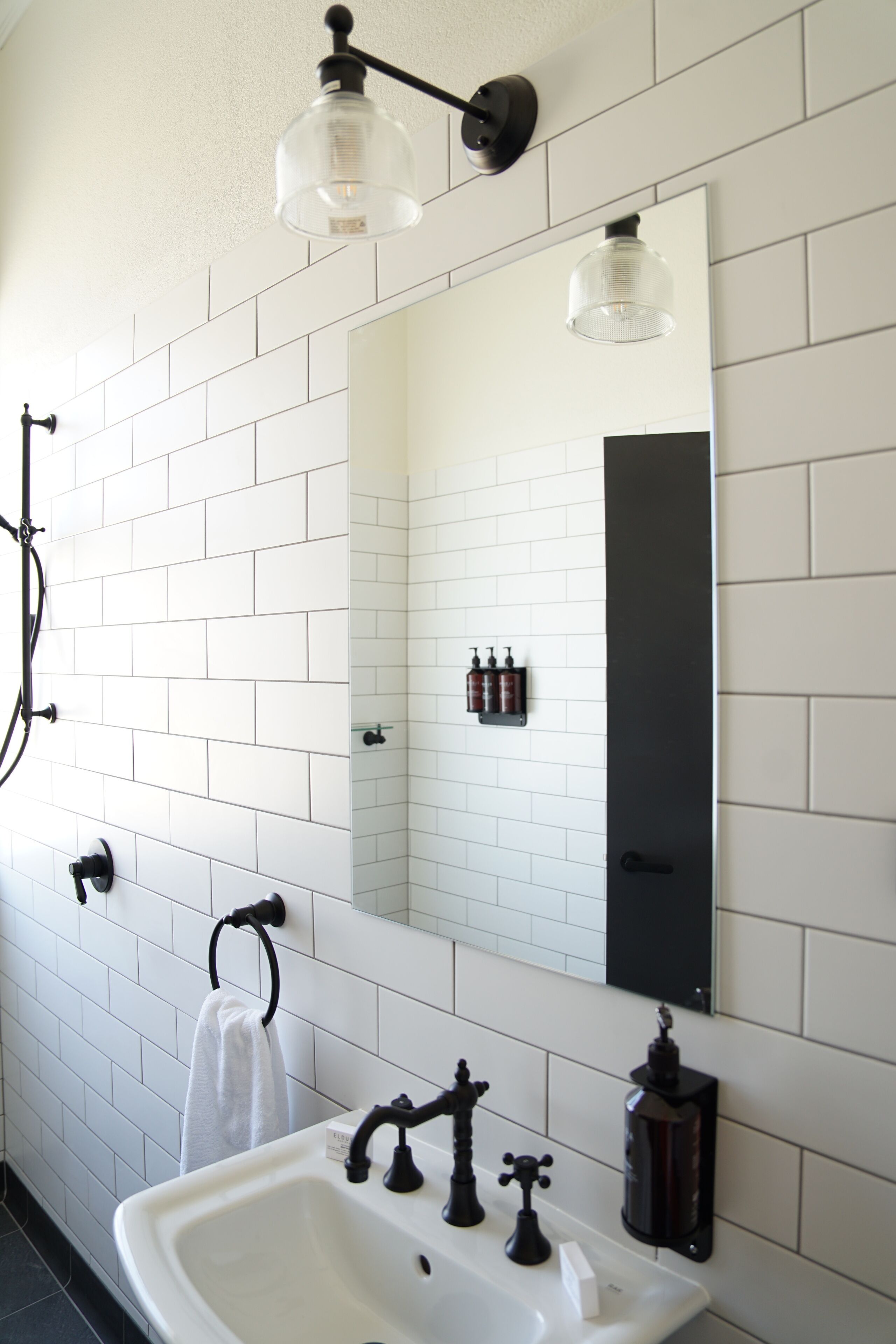 king ensuite room | bathroom | shower, slippers, towels