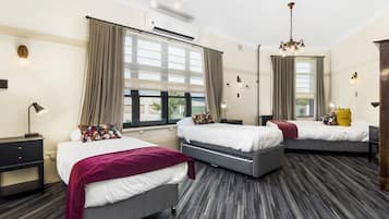 Family Room, Non Smoking, Shared Bathroom | Desk, free WiFi, bed sheets