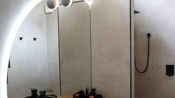 Bathtub, hair dryer, towels