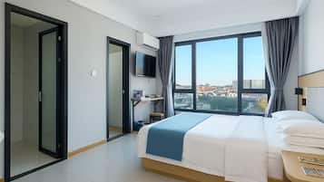 Minibar, wifi gratis y ropa de cama