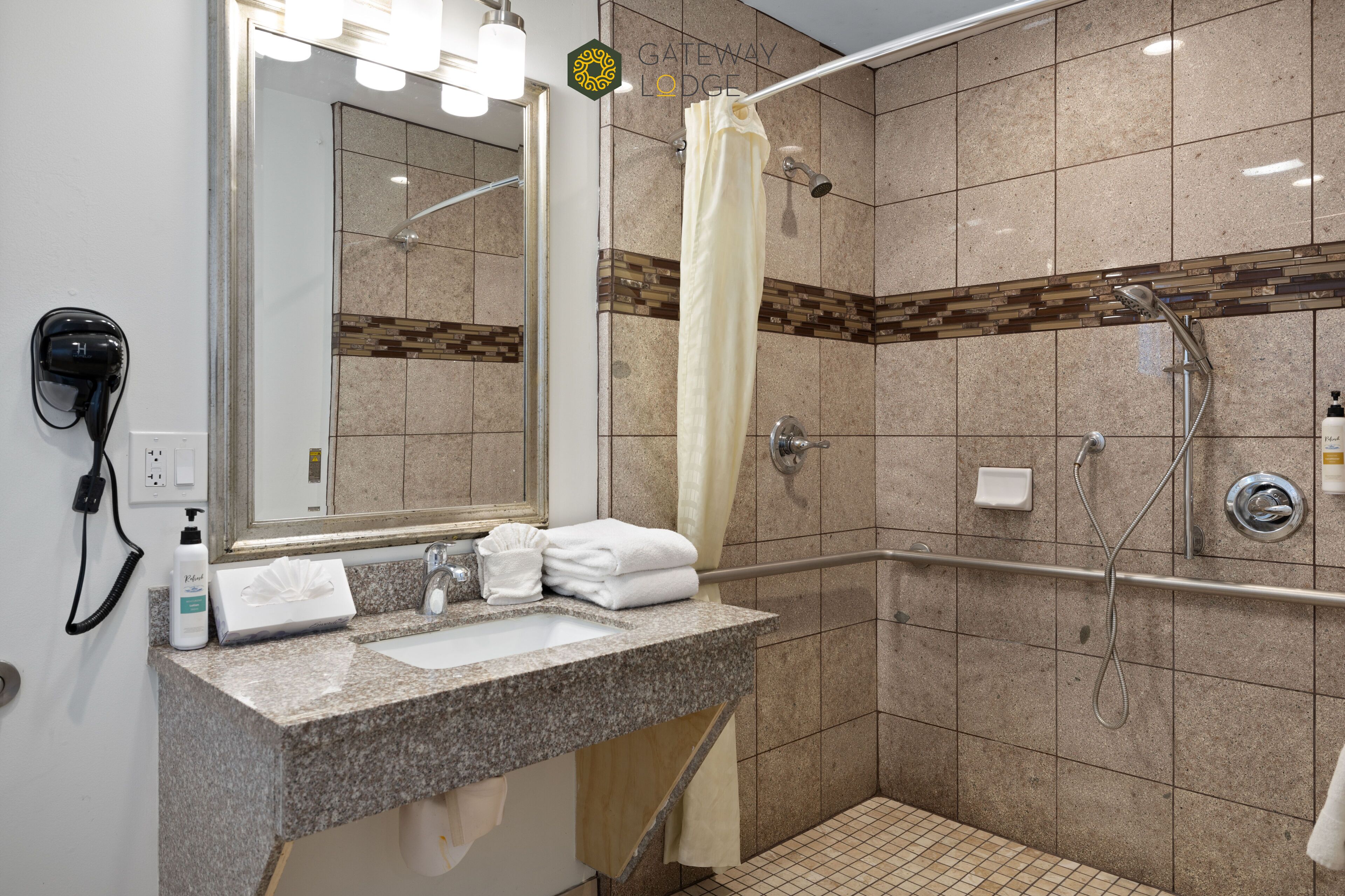 classic single room, 1 queen bed, accessible | bathroom | shower, hair dryer, towels, soap