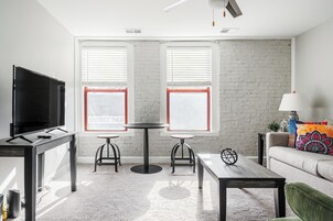 City Apartment | Living area | 50-inch Smart TV with digital channels, TV, streaming services