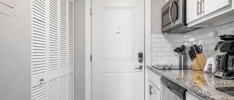 Full-sized fridge, microwave, stovetop, dishwasher