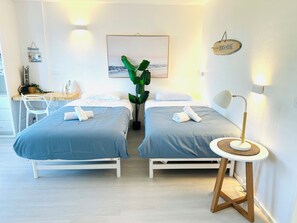 1 bedroom, desk, iron/ironing board, travel cot