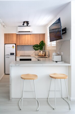 Fridge, coffee/tea maker, electric kettle, toaster