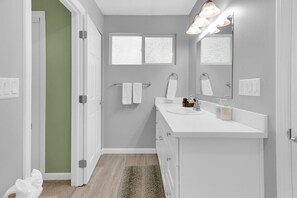 Combined shower/bathtub, hair dryer