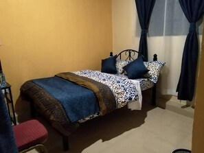 Standard Room | Bed sheets - Sizzling Waters Resort (Nakuru)