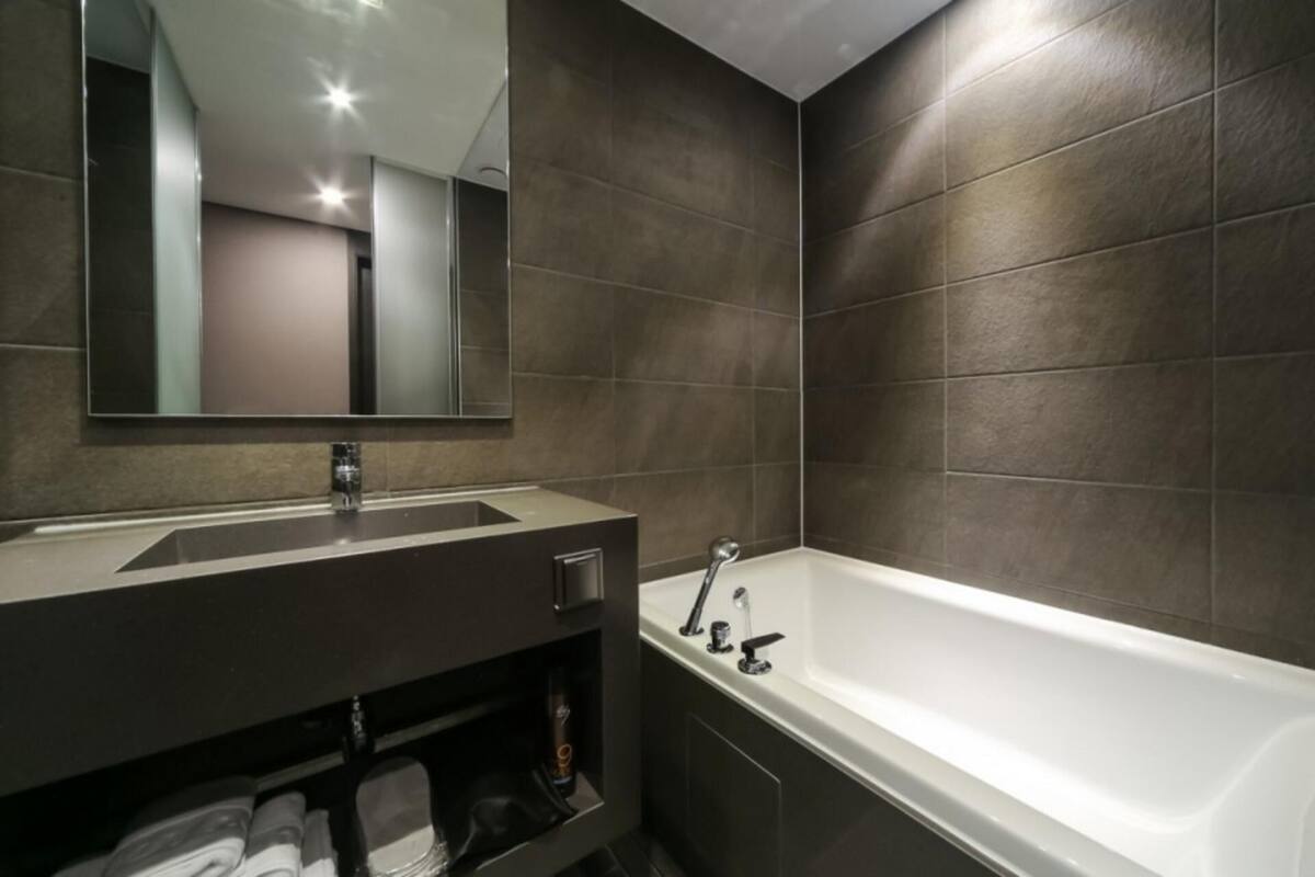 room (family twin (2 pcs with high specific) | bathroom | hair dryer, towels, soap, shampoo