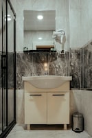 Hair dryer, slippers, towels, soap