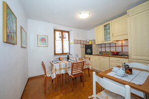 Family Apartment, Multiple Bedrooms (Appartamento Miorelli 1) | Dining - Appartamento Miorelli (Nago-Torbole)