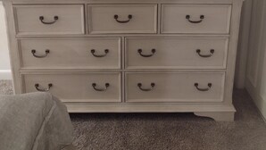 A white dresser with drawers and a television on top. - Surf Court Unit #1-Remodeled villa across the street from the ocean (Hilton Head Island)