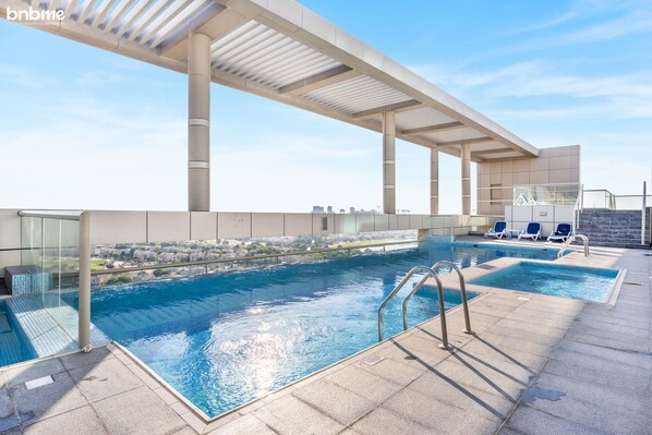 Outdoor pool - bnbme | The Medalist | 1 BDR (Dubai)