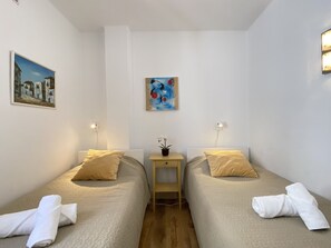 2 dormitorios, tabla de planchar con plancha, wifi gratis y ropa de cama