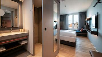 Shower, eco-friendly toiletries, hair dryer, towels