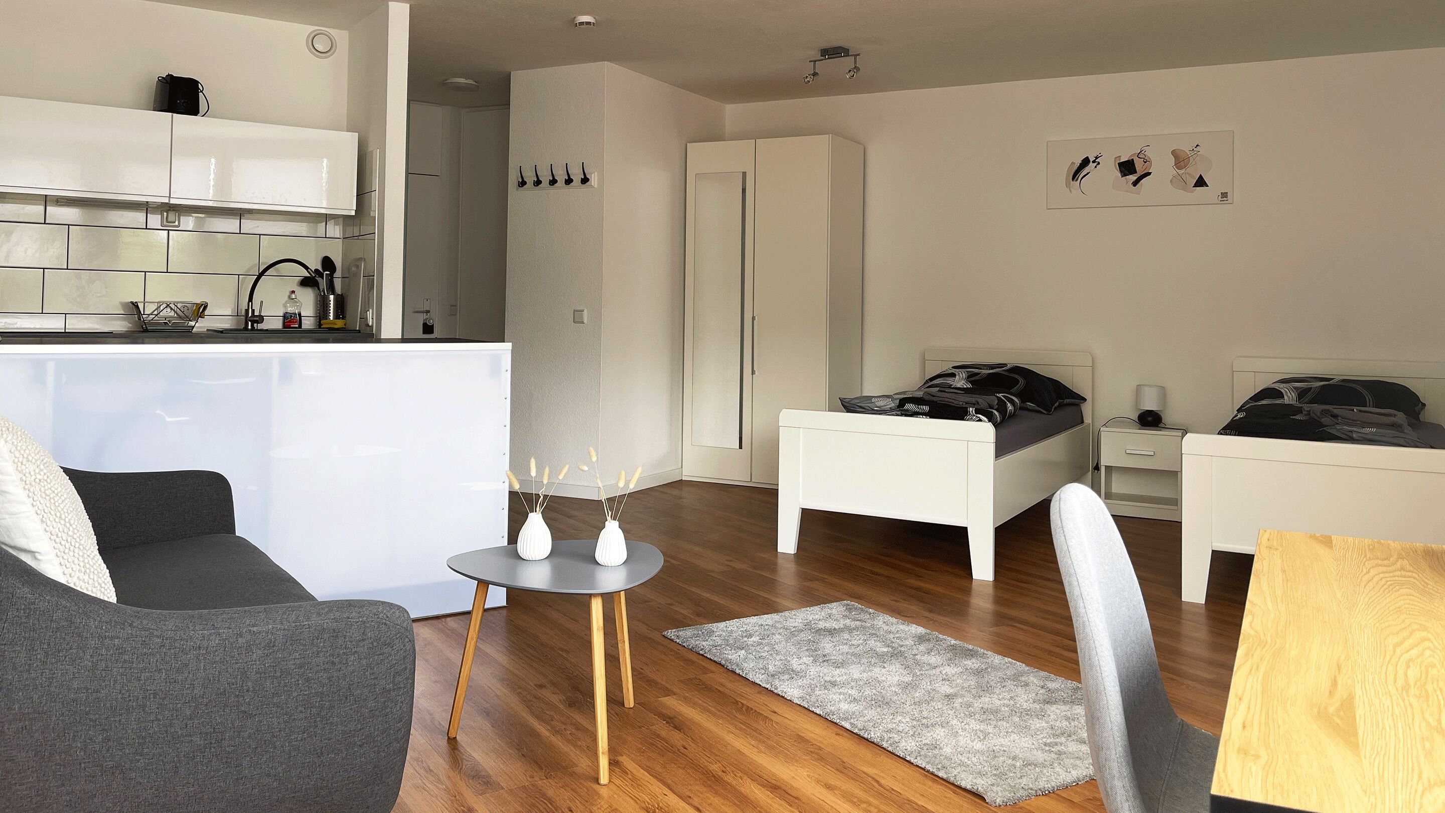 Standard-Studio, 2 Einzelbetten | Wohnbereich | Fußbodenheizung