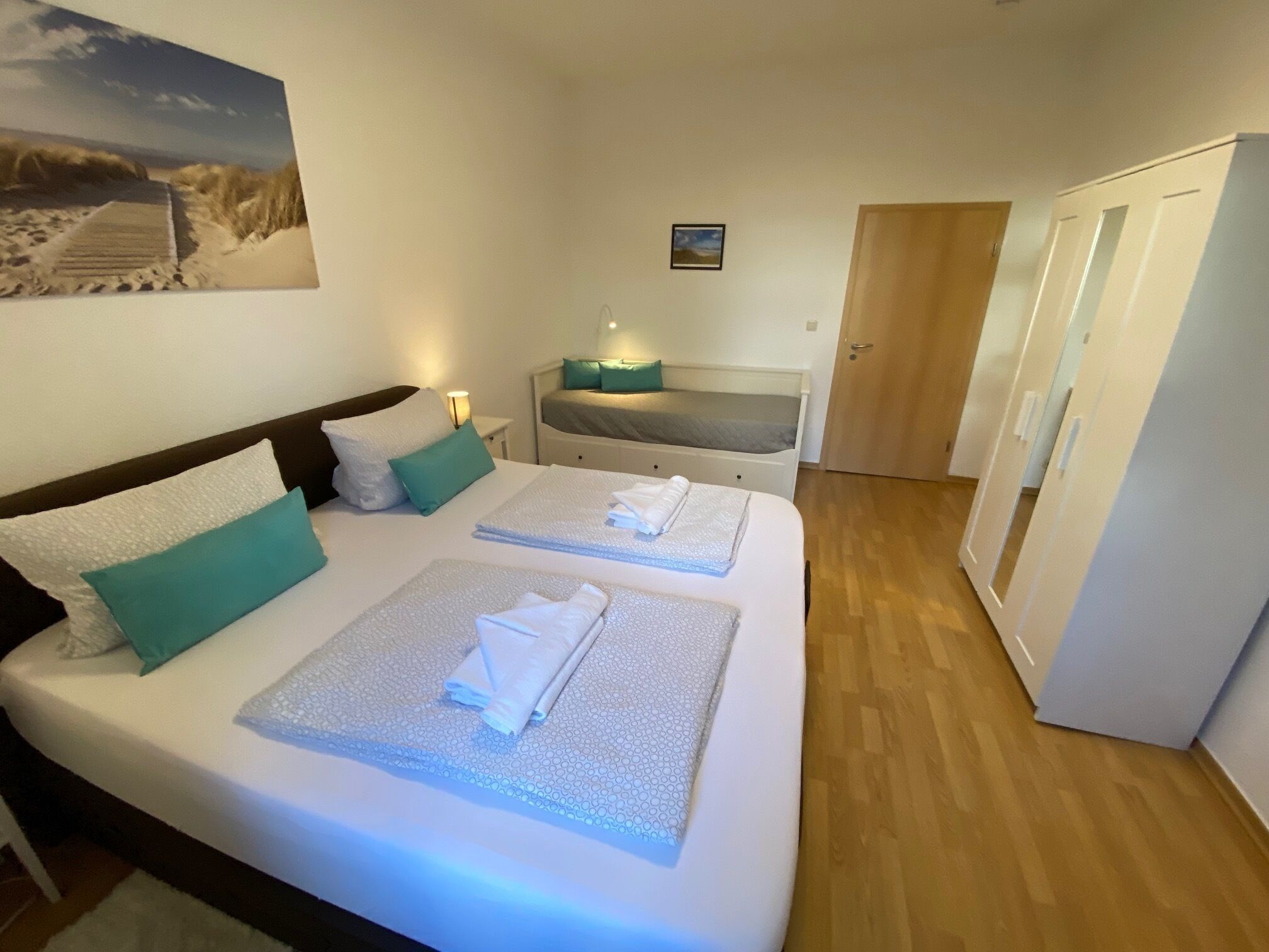 2 bedrooms, desk, iron/ironing board, travel crib