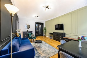 Televisión 120 cm con canales de televisión por cable, Netflix