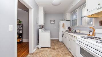 Microwave, dishwasher, coffee/tea maker, cookware/dishes/utensils