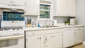 Microwave, dishwasher, coffee/tea maker, cookware/dishes/utensils