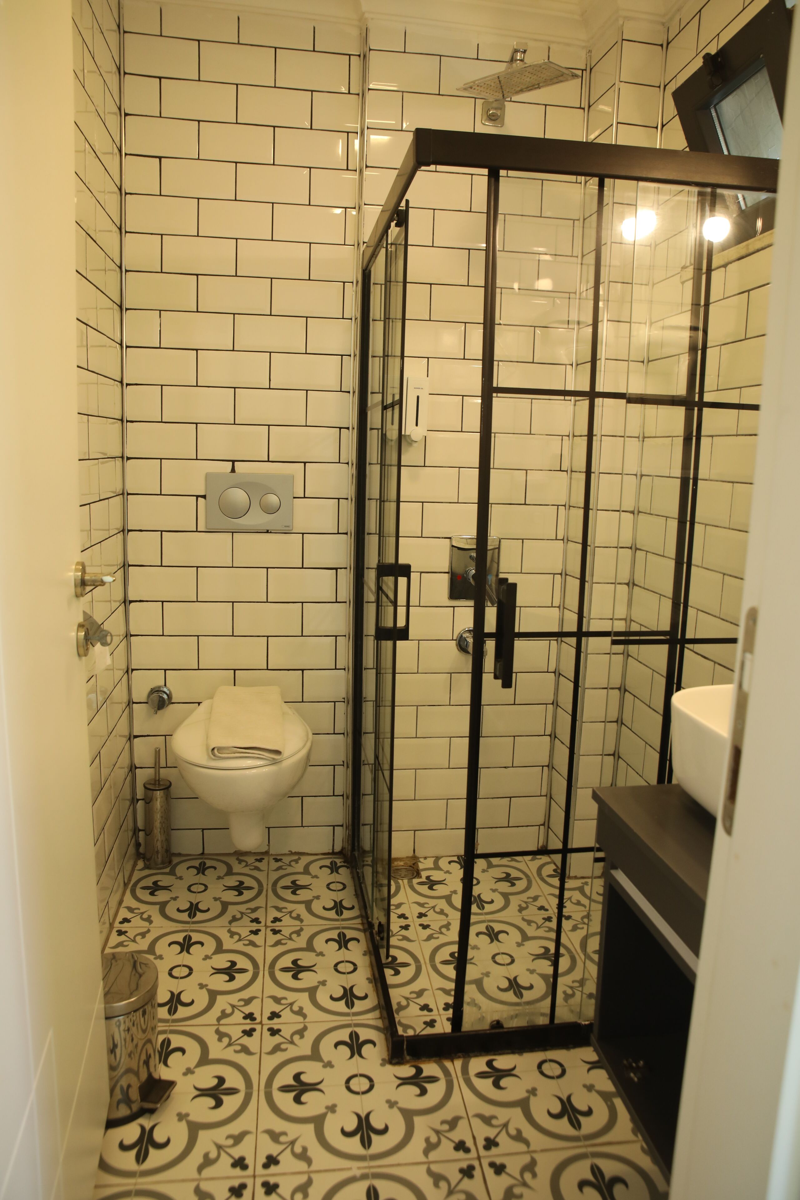 shower, rainfall showerhead, hair dryer, slippers