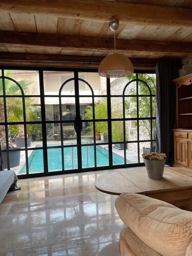 House in the heart of the village with swimming pool
