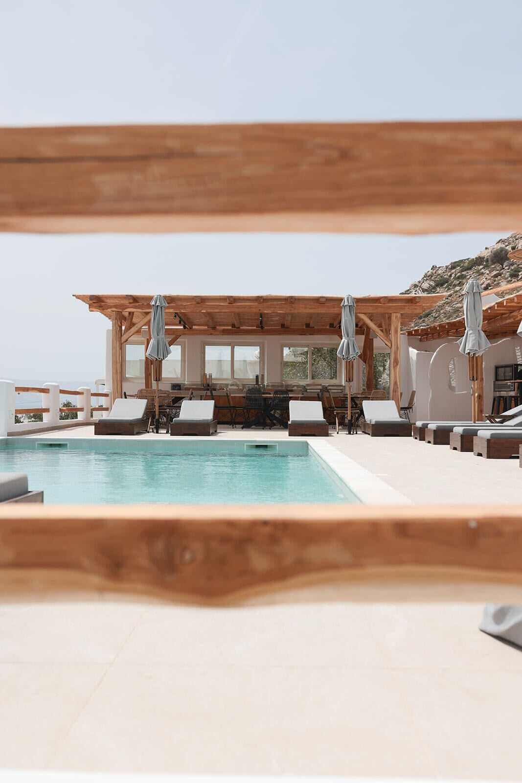 Seasonal outdoor pool, open 8:00 AM to 9:00 PM, pool umbrellas