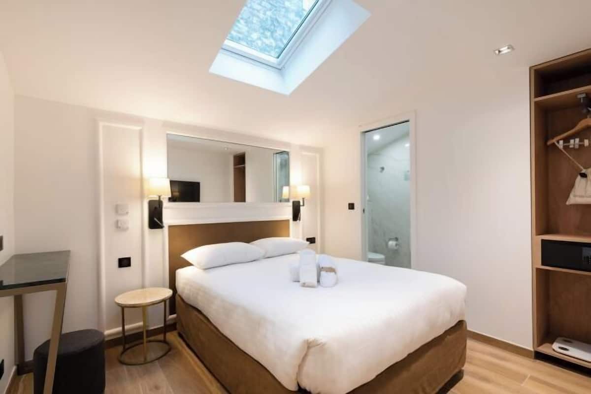 1 quarto, roupas de cama premium, cofres nos quartos, cortinas blackout