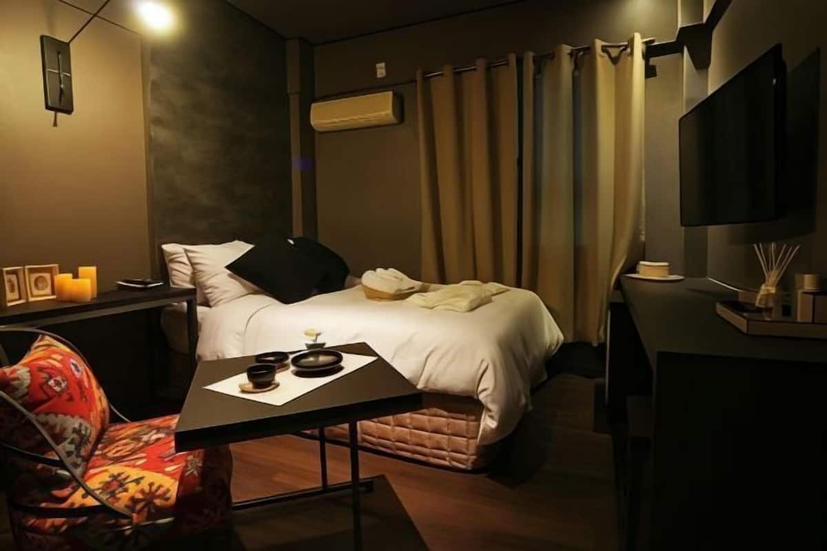 Premium bedding, memory foam beds, blackout drapes, free WiFi