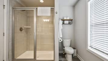 Combined shower/tub, hair dryer, towels, toilet paper