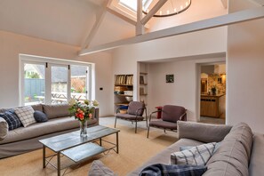 Smart TV, fireplace, table football, books