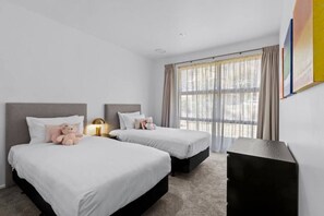 4 bedrooms, desk, blackout curtains, iron/ironing board