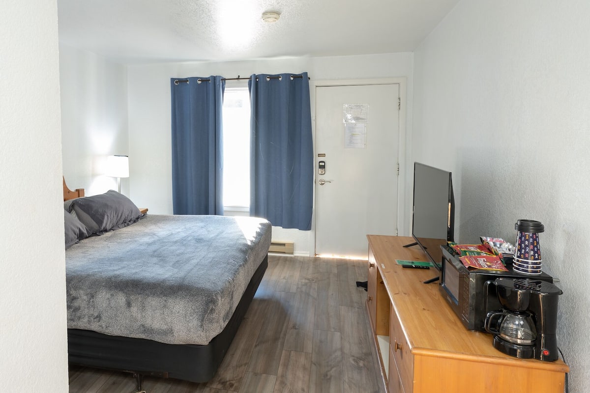 Minibar, laptop workspace, blackout curtains, iron/ironing board