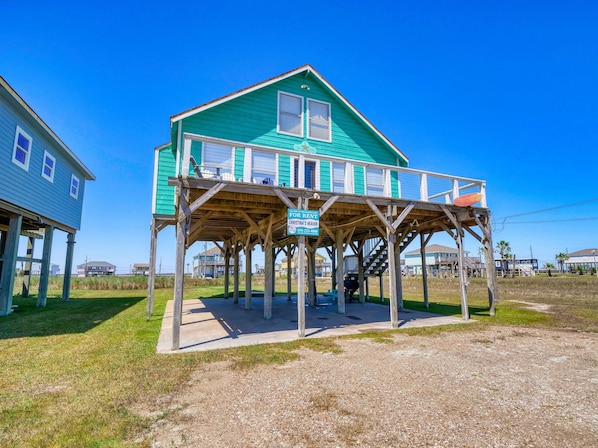 A wooden structure with a sign indicating it is for rent.