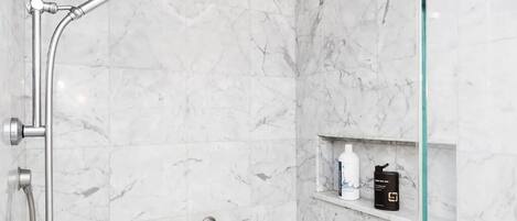 Shower, hair dryer, towels, soap