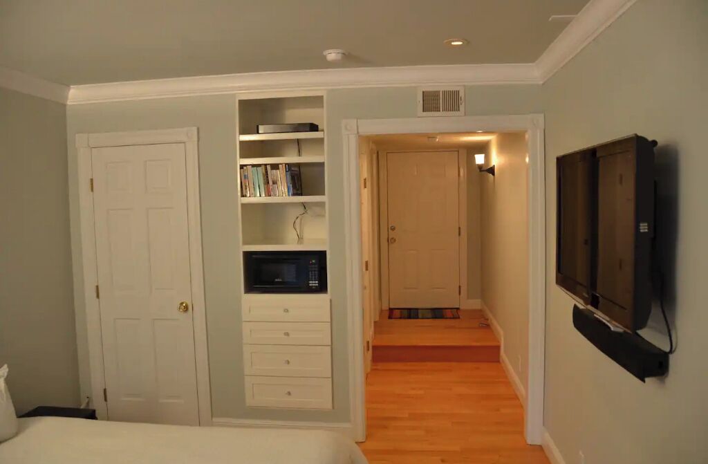 1 bedroom, desk, iron/ironing board, travel crib