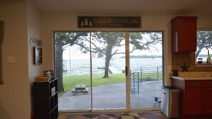 A kitchen with a view of Eagle Mountain Lake, Texas. - Make memories in this cozy water front house on Eagle Mountain Lake. (Azle)
