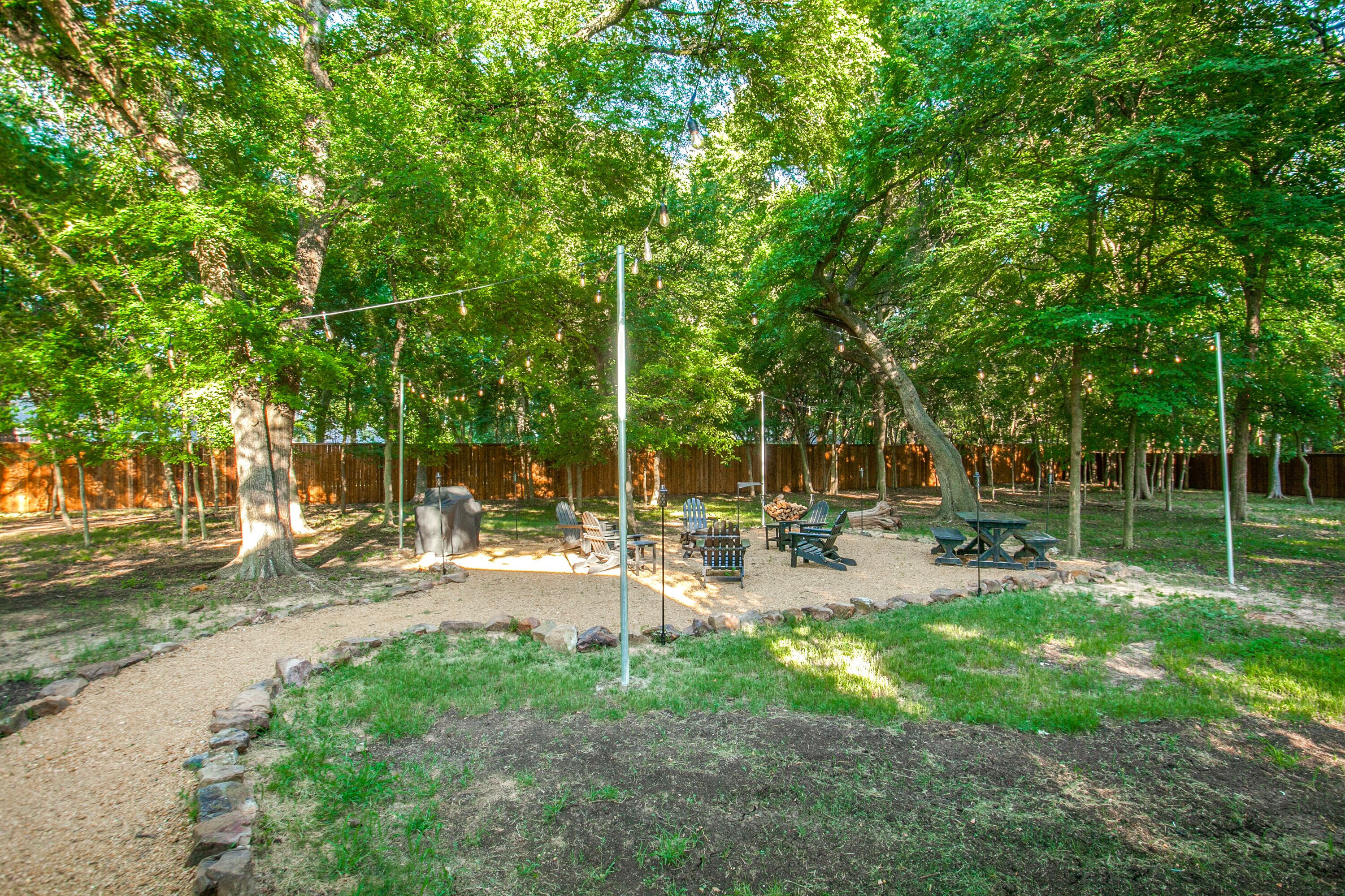 Remodeled on acreage with firepit, hot tub, and super close to Downtown McKinney