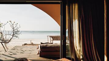 Suite, Oceanfront | Minibar, in-room safe, individually decorated, blackout curtains