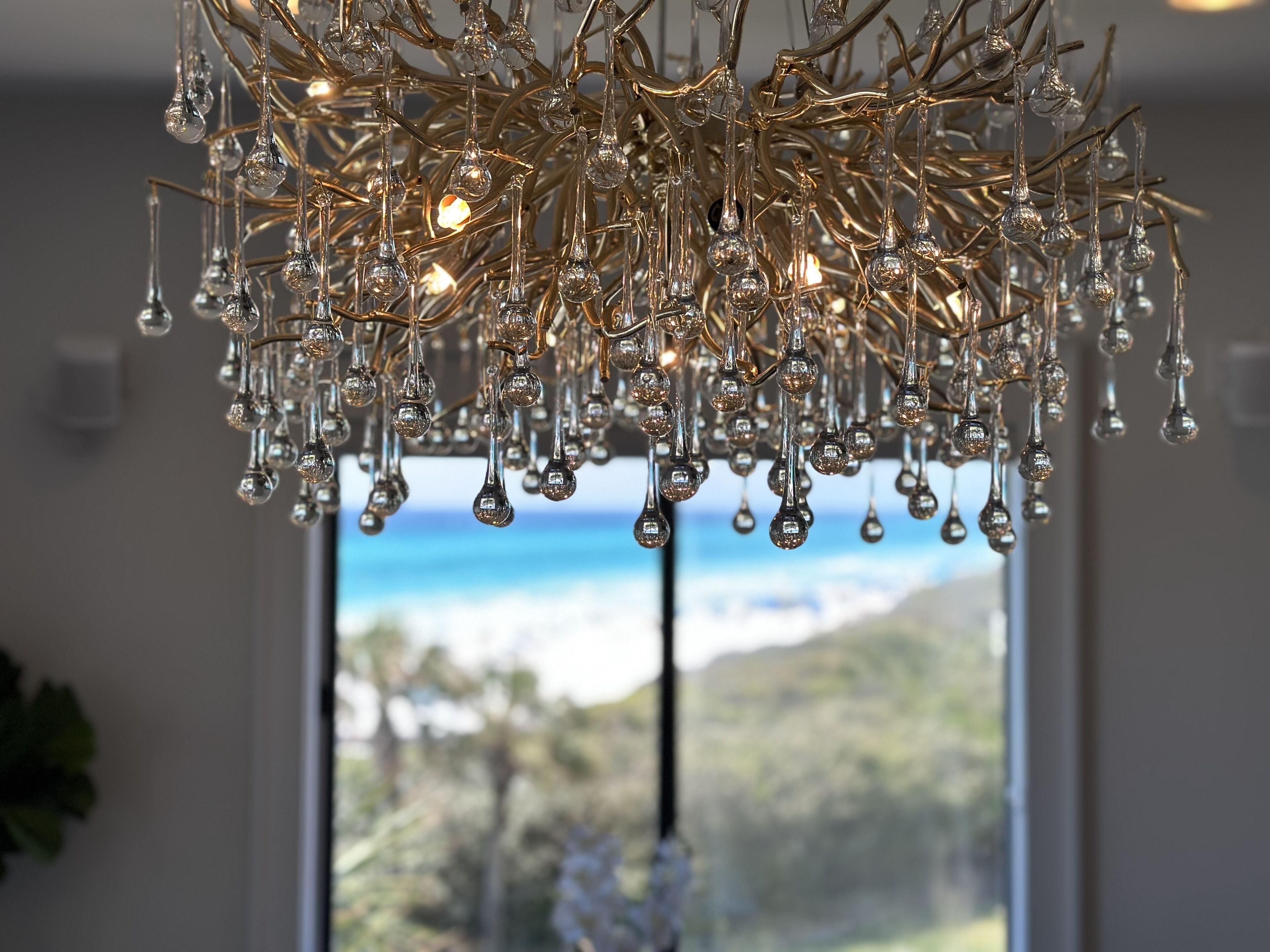 A chandelier with multiple hanging crystal elements.