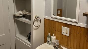 Combined shower/tub, hair dryer, towels, soap