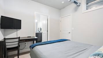 2 bedrooms, premium bedding, desk, laptop workspace