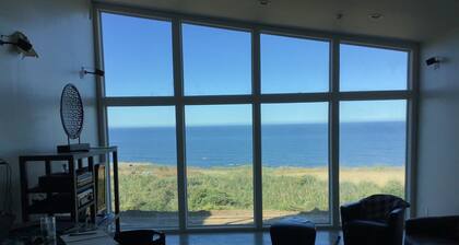 Sweeping ocean views in stunning modern house on 20 acres