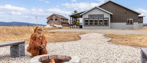 Guests can enjoy a peaceful outdoor setting with a fire pit and scenic views of the surrounding landscape.