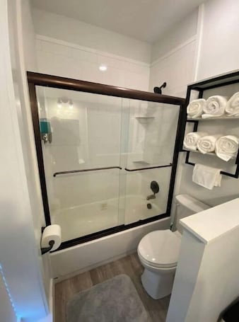 Combined shower/tub. The Lab! Come stay in our brand new space.