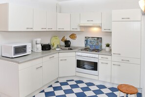 Imagen sin descripción, 5 de 8, botón